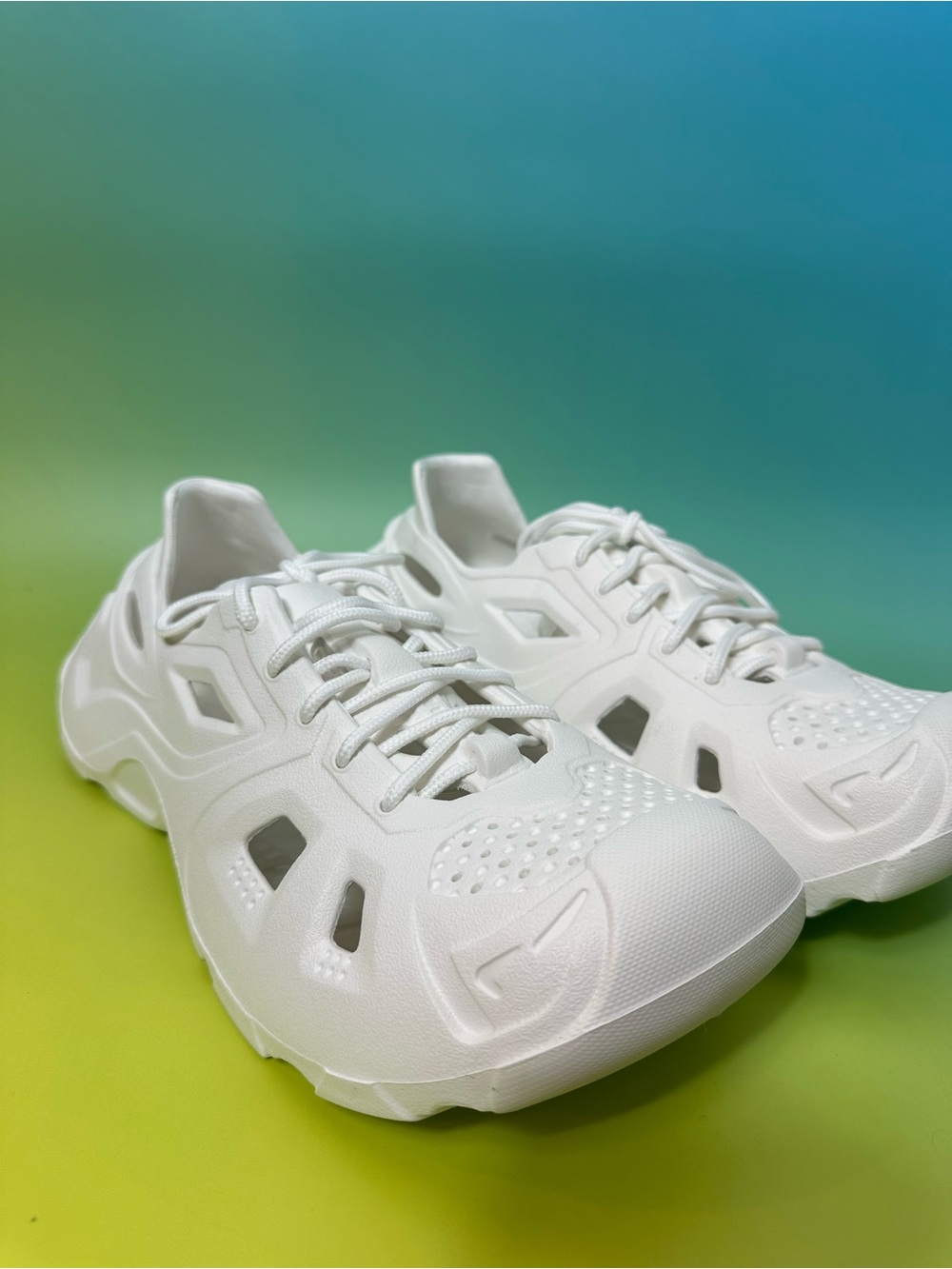 All-White Athletic Sneakers with Cutout Design